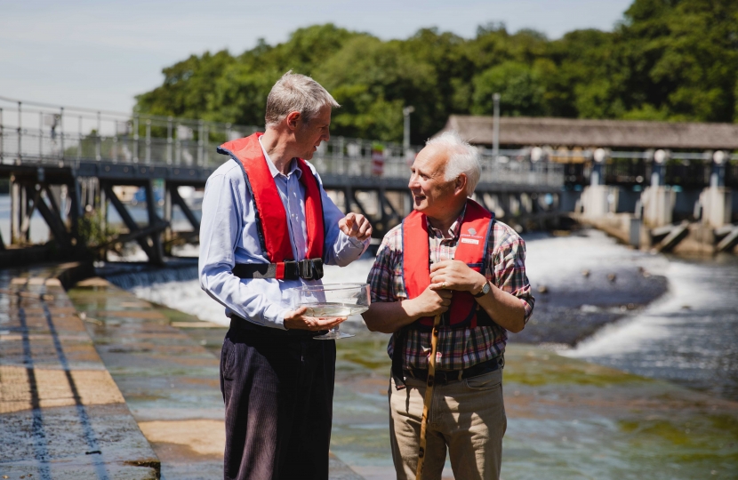 Zac Goldsmith MP releasing eels into the river Thames